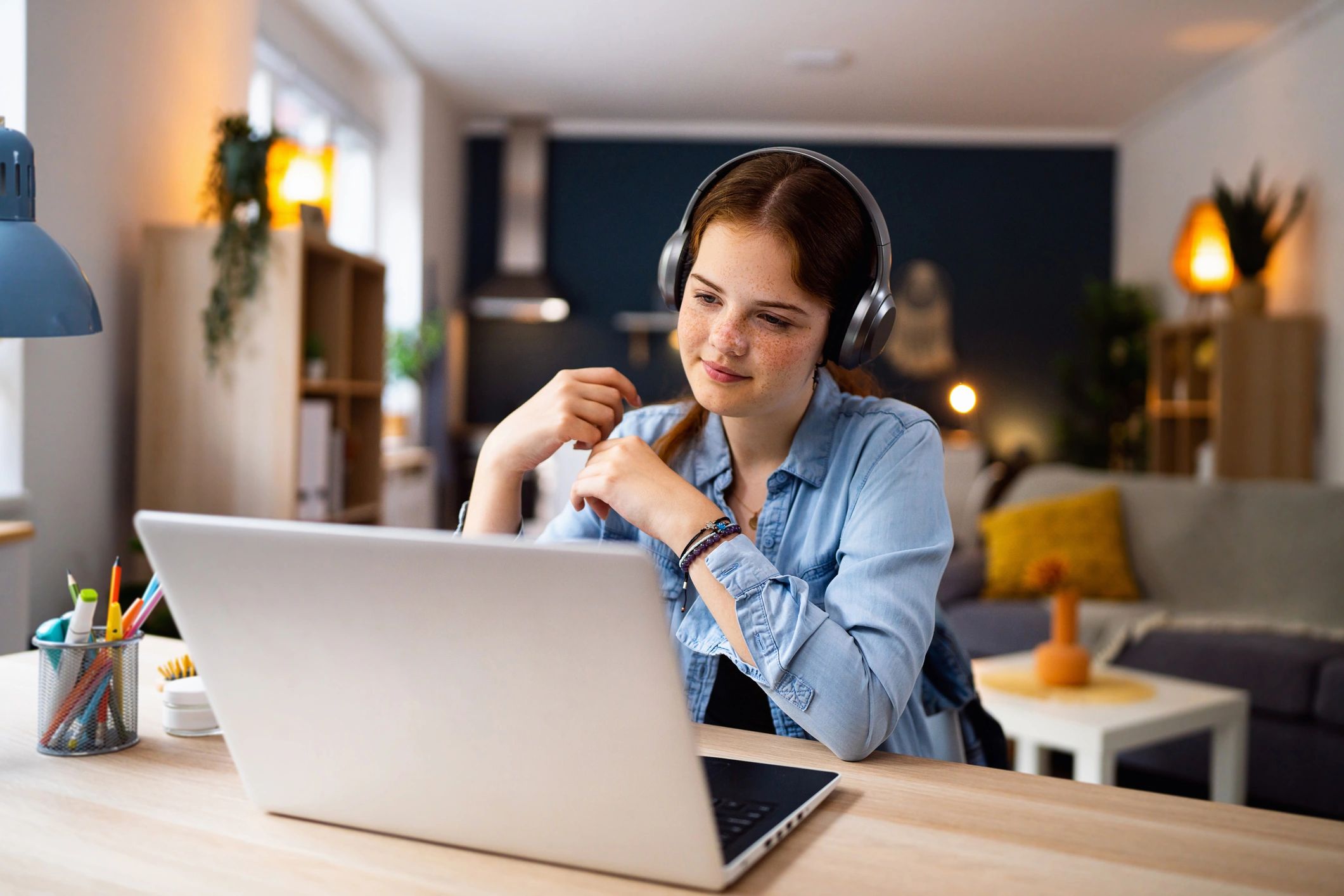 Student attending an online tutoring session on a laptop