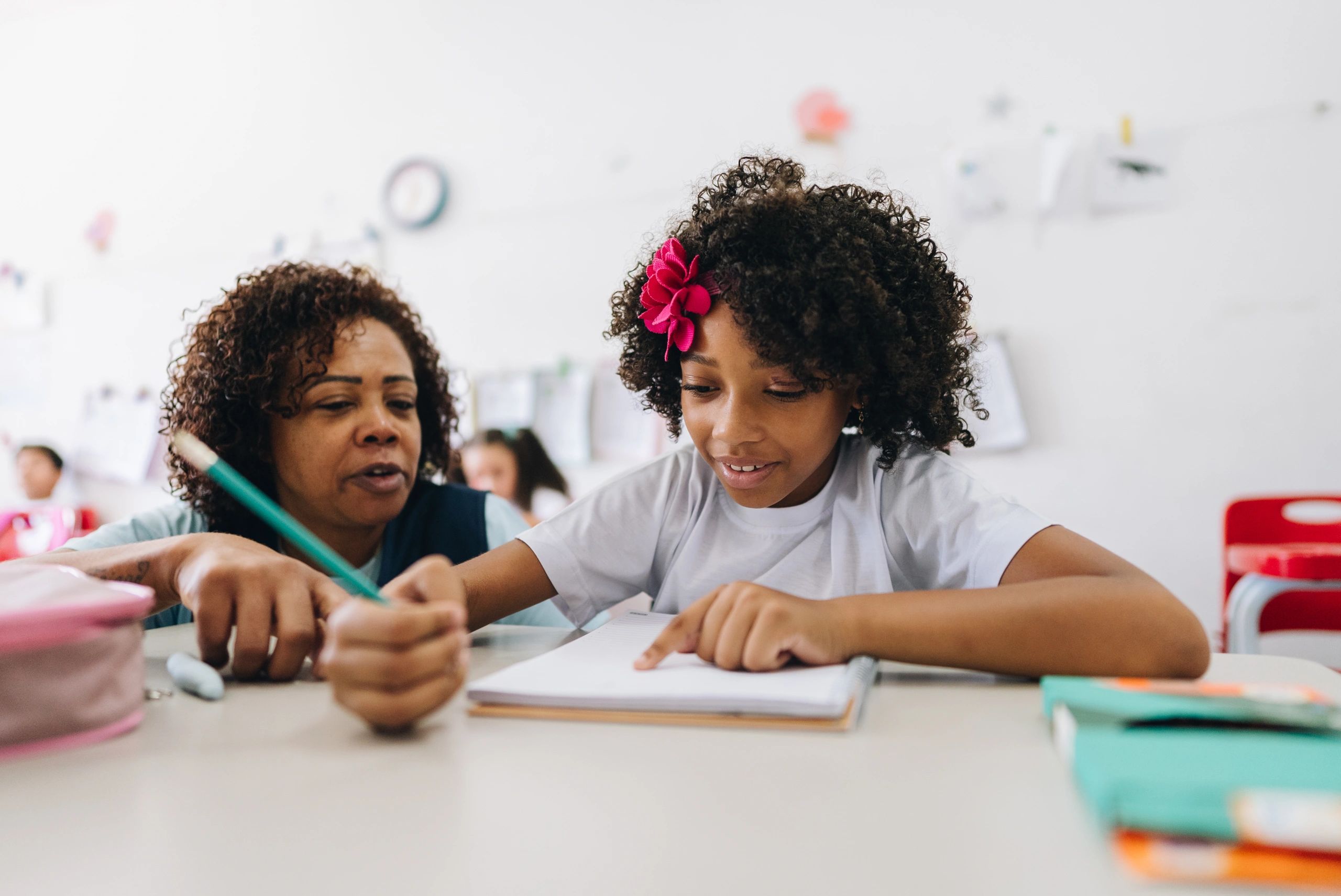 One-to-one tutoring session in a classroom setting